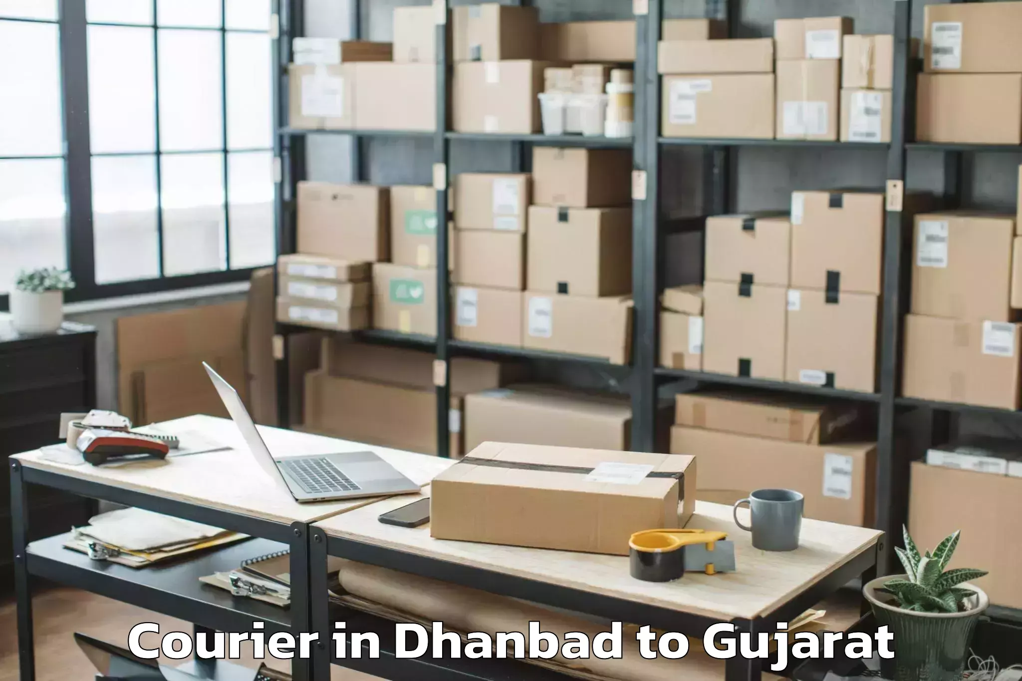 Reliable Dhanbad to Rudra Mata Airport Bhj Courier